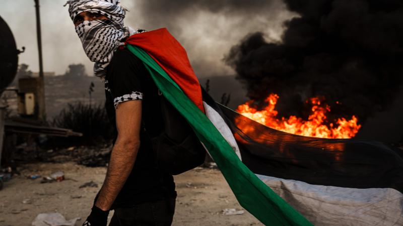 Palestinian protester, Beit El, Israel, Oct. 13, 2023