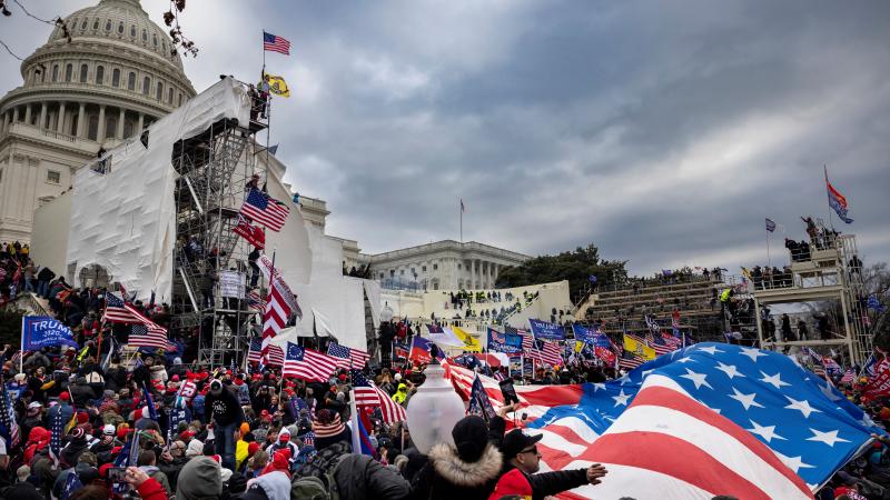 WASHINGTON, DC - JANUARY 6: Trump supporters clash with police and security forces as people try to storm the US Capitol on January 6, 2021 in Washington, DC.