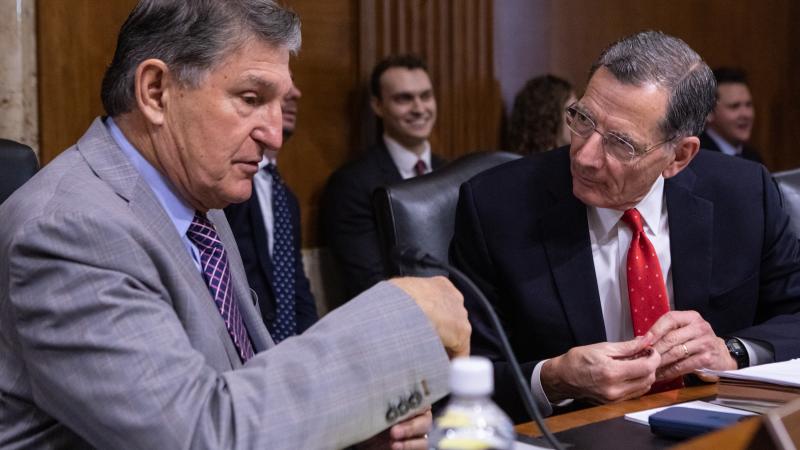 Joe Manchin, John Barrasso, Jan. 11, 2024, Washington, D.C.