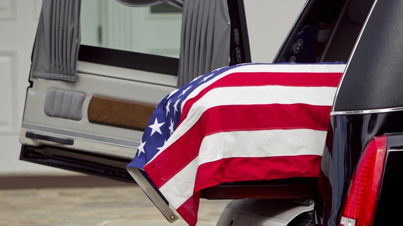 Flag over coffin