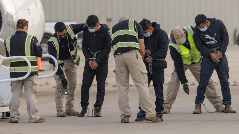 Deported migrants, plane, Harlingen, Texas, May 5, 2023