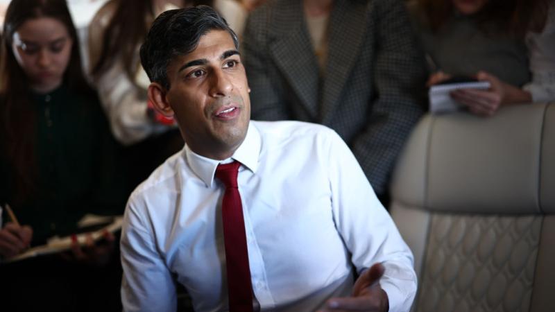 Prime Minister Rishi Sunak speaks with journalists on board of the plane on the way to Warsaw Chopin airport on April 23, 2024 in Warsaw, Poland. 