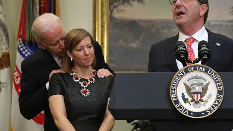 Joe Biden with Ashton Carter's wife Stephanie at swearing-in