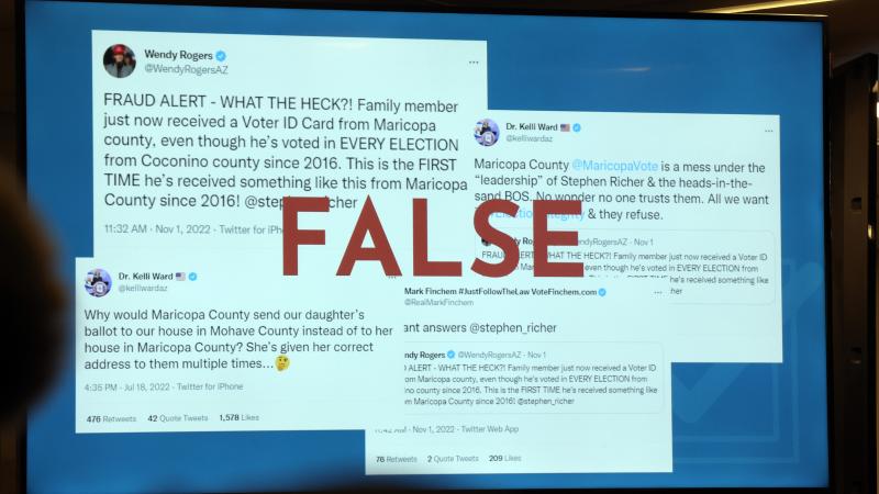 An image depicting false election information is displayed as Stephen Richer, Maricopa Country Recorder, speaks at a press conference on the midterm elections on November 07, 2022 in Phoenix, Arizona.