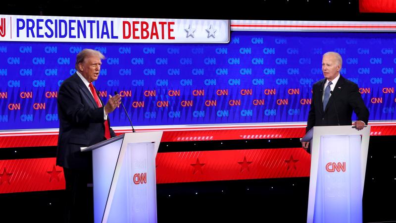 U.S. President Joe Biden (D) and Republican presidential candidate, former U.S. President Donald Trump participate in the CNN Presidential Debate at the CNN Studios on June 27, 2024 in Atlanta, Georgia. 