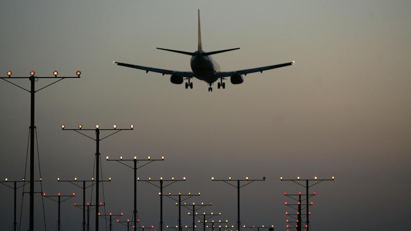 April 15, 2008. A jet comes in for landing at Los Angeles International Airport (LAX) on April 15, 2008 in Los Angeles, California