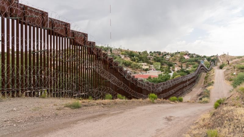 The US Mexico border fence in Nogales, Arizona USA