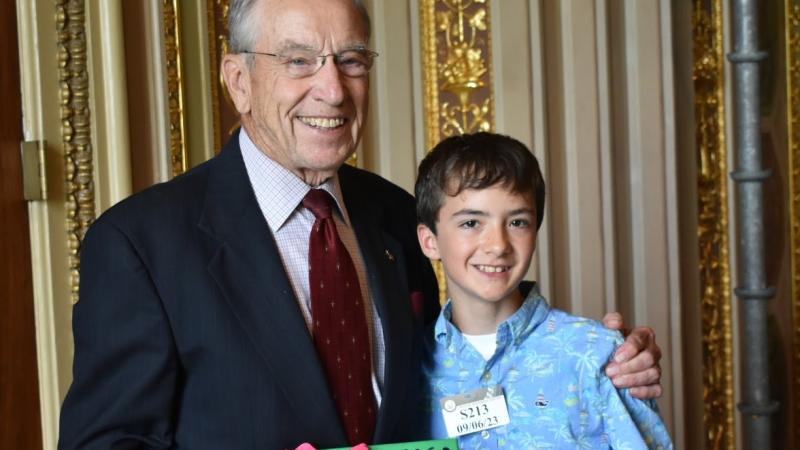 Sen. Chuck Grassley and University of Maine student Samson Cournane