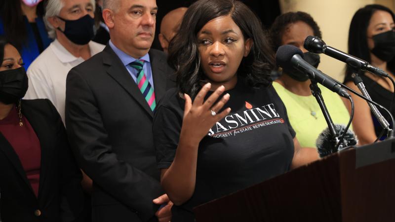 Texas State Rep. Jasmine Crockett is joined by Democratic members of the Texas House and Senate during a news conference halfway through the 30-day special session called by Governor Greg Abbott at the Washington Plaza Hotel on July 23, 2021 in Washington, DC