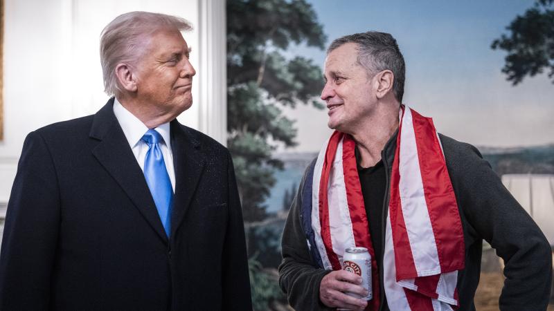 President Donald J Trump speaks with Marc Fogel in the Diplomatic Reception Room at the White House on Tuesday, Feb 11, 2025
