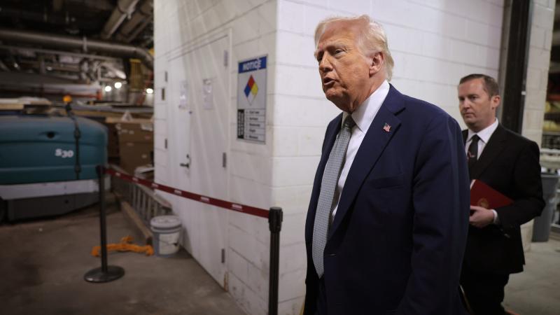 U.S. President Donald Trump tours water damage in the power control room during a guided tour of the John F. Kennedy Center for the Performing Arts and leads a board meeting on March 17, 2025 in Washington, DC.
