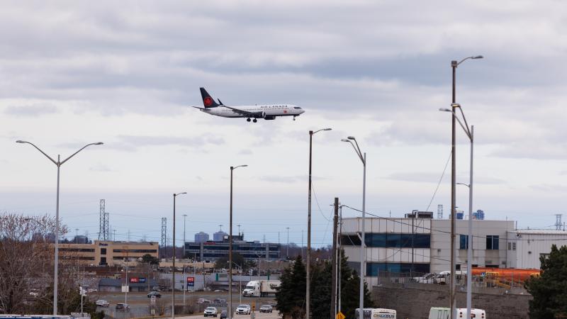 An Air Canada plane approaches the runway as it lands at the Toronto Pearson International Airport on March 31, 2025 in Toronto, Ontario, Canada
