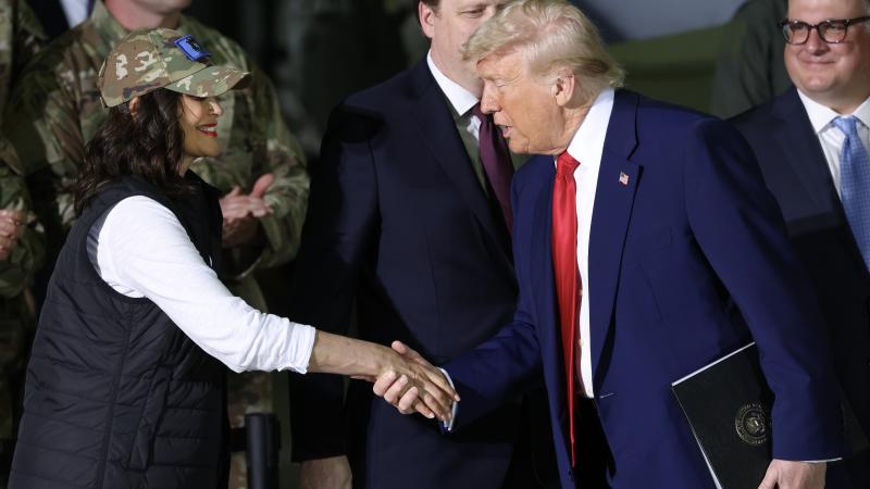 Gretchen Whitmer and Donald Trump