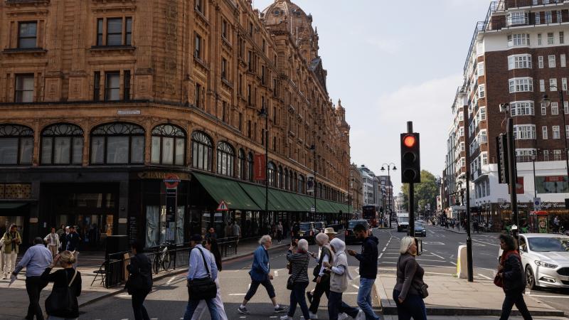 Members of the public walk past the Harrods store in Knightsbridge on September 19, 2024 in London, England.