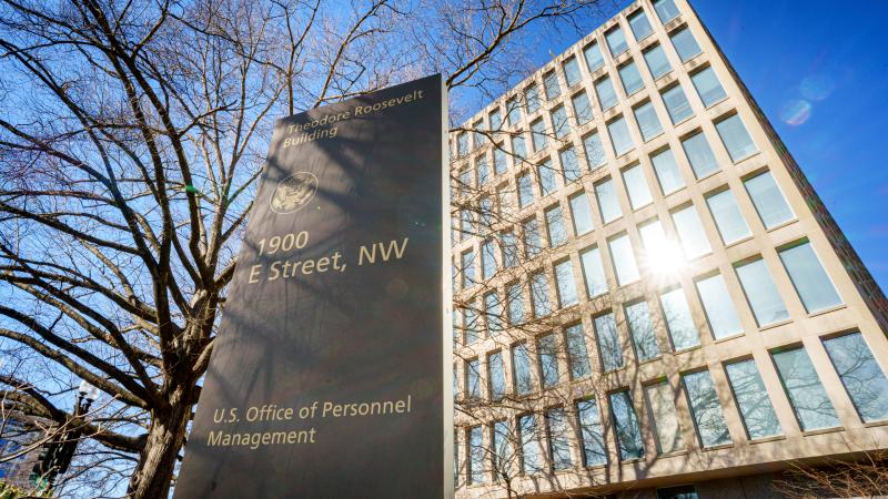 A sign marks the location of the U.S. Office of Personnel Management (OPM) headquarters building on January 29, 2025, in Washington, DC.