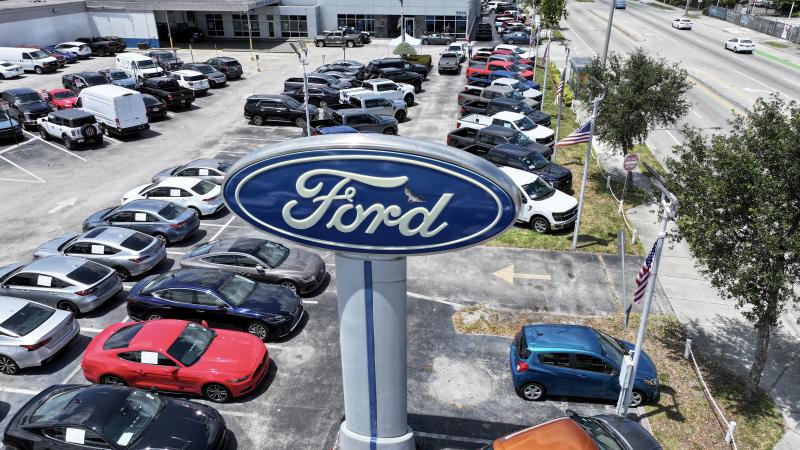 An aerial view as a Ford sign stands on the sales lot of the Metro Ford dealership on May 06, 2025 in Miami, Florida.