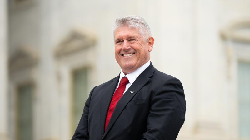 Rep.-elect Troy Downing, R-Mont., poses for a photo on the House steps after freshman members of Congress posed for their class photo on the House steps of the Capitol on Friday, November 15, 2024.