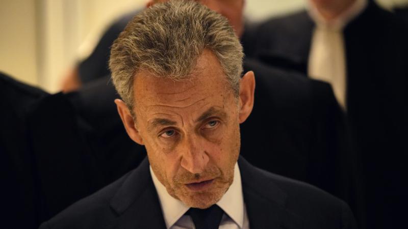 Former French president Nicolas Sarkozy addresses the press after he was found guilty on September 25, 2025 in Paris, France.