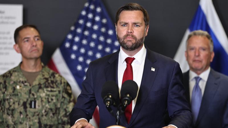 US Vice President JD Vance listens to a question during a press conference following a military briefing at the Civilian Military Coordination Center in southern Israel on October 21, 2025