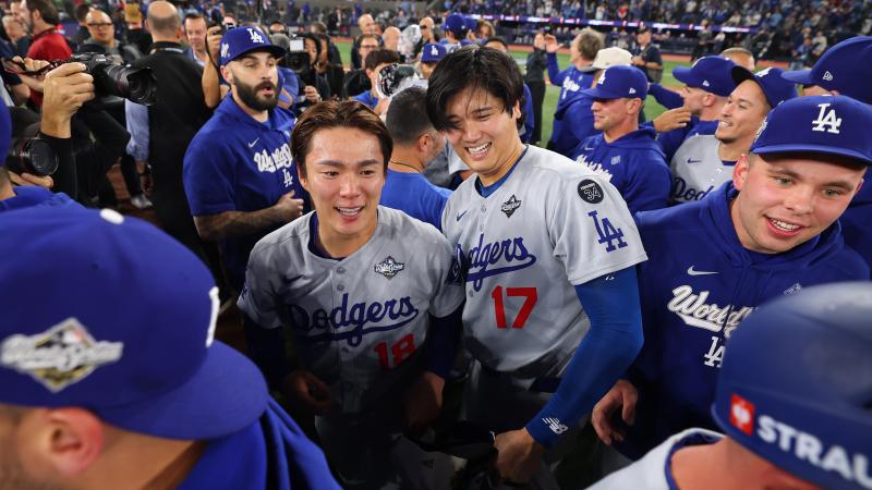 Shohei Ohtani and Yoshinobu Yamamoto celebrating 2025 World Series