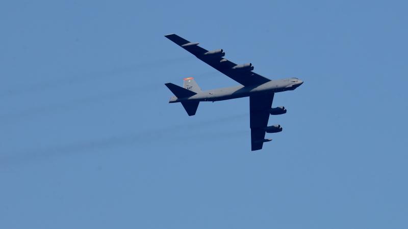 A B52 bomber is seen during a military flyover as part of Independence Day festivities on July 4, 2020 as seen from Bayonne, New Jersey.