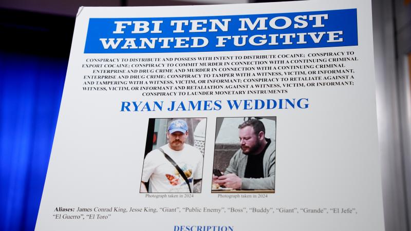 The indictment of a former Olympic snowboarder Ryan Wedding, charging him with murder and money laundering in connection to a drug trafficking organization at the Justice Department on November 19, 2025 in Washington, DC. 