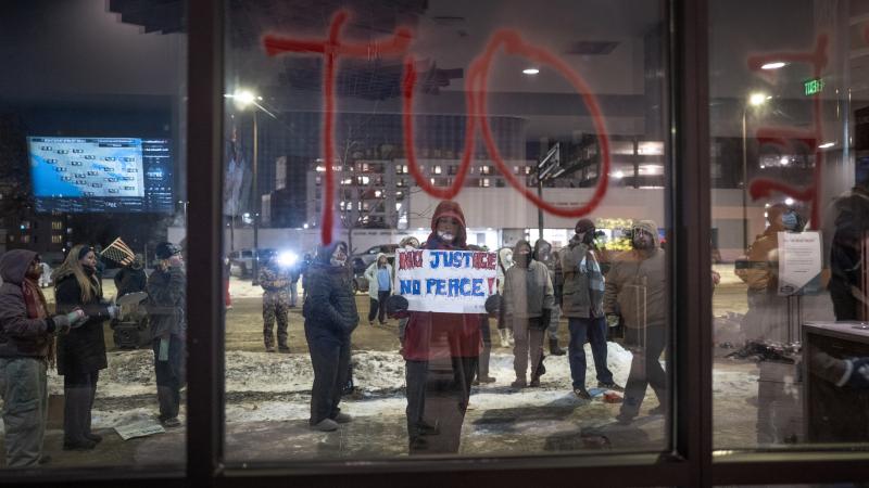 Demonstrators protest at a hotel on January 25, 2026 in Minneapolis, Minnesota