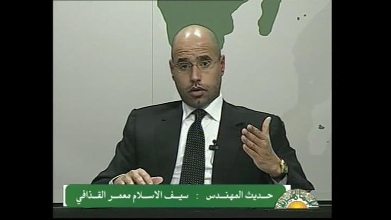 Libyan state television on February 20, 2011 shows a televised address by Libyan leader Moamer Kadhafi's son Saif al-Islam