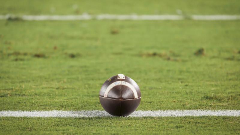 A close-up view of a football on the field at Stanford Stadium before a college football game between the Stanford Cardinal and the Notre Dame Fighting Irish played on November 29, 2025 in Palo Alto, California. 