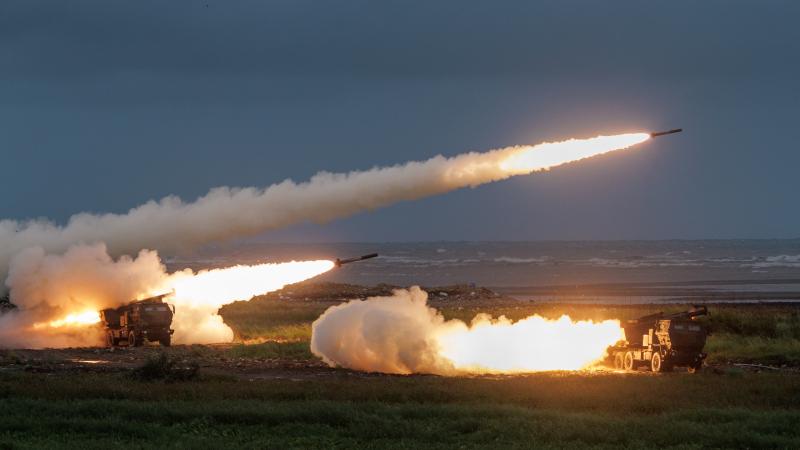 Taiwan fires rockets