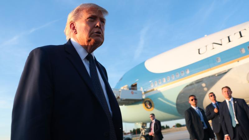President Trump walks to speak to reporters as he arrives at Orly Airport to attend dinner with French President Emmanuel Macron at Chateau de Versailles on June 17 in Orly, France.