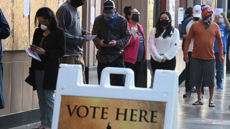 People wait in line to vote Nov. 3, 2020 in Los Angeles, California