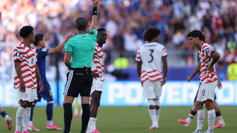 Balogun receiving red card durinh U.S. match against Bosnia 