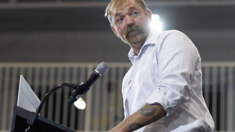 Graham Platner speaks at his primary election event on Thursday in Blue Hill, Maine.