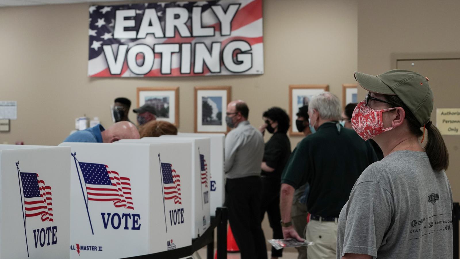 A woman waits in line to cast her vote on the second day of early voting at the Hamilton County Election Commission on October 15, 2020 in Chattanooga, Tennessee.