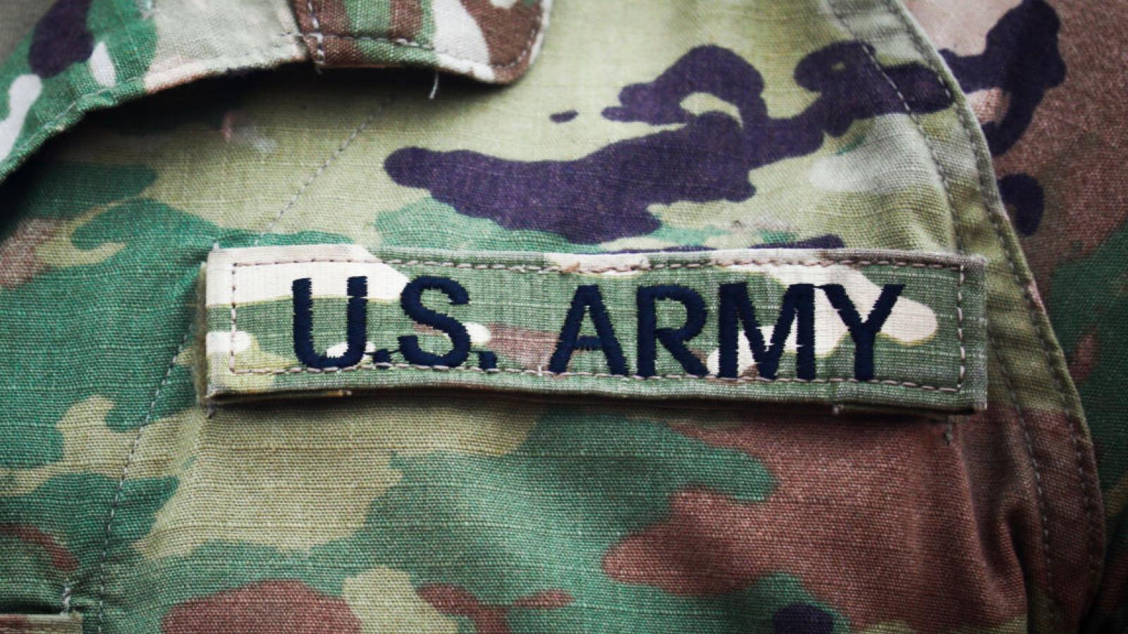 Army badge on soldier's uniform in August 2020
