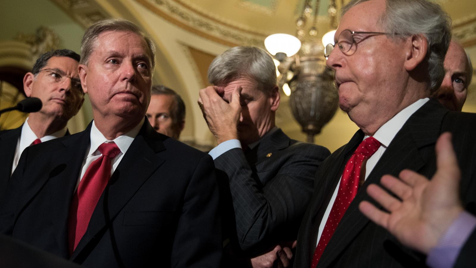 (L to R) Senators John Barrasso (R-WY), Lindsey Graham (R-SC), Bill Cassidy (R-LA) and Majority Leader Mitch McConnell (R-KY) hold a news conference following their weekly policy luncheon, September 26, 2017 in Washington, DC.
