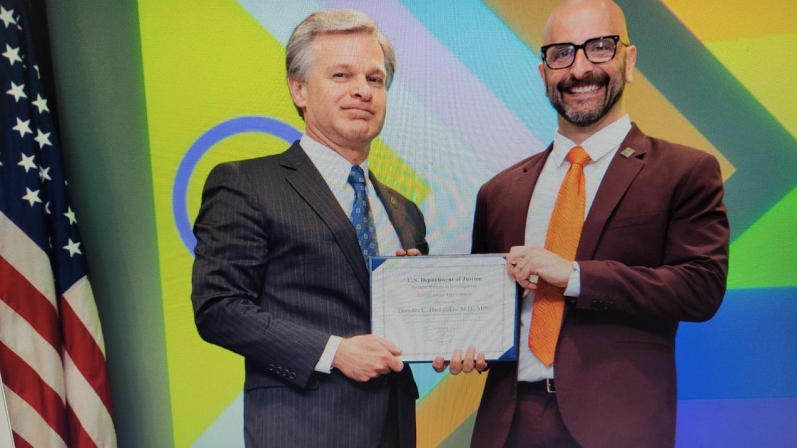 FBI Director Chris Wray and White House monkeypox coordinator Demetre Daskalakis