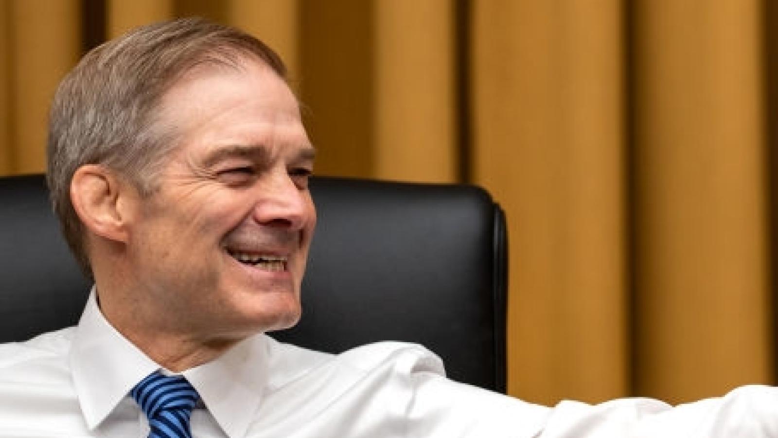 WASHINGTON, DC - MAY 16: Chairman Rep. Jim Jordan (R-OH) smiles while chatting with Rep. Adam Schiff (D-CA) and Rep. Glenn Ivey (D-MD) before the start of a House Judiciary Committee markup