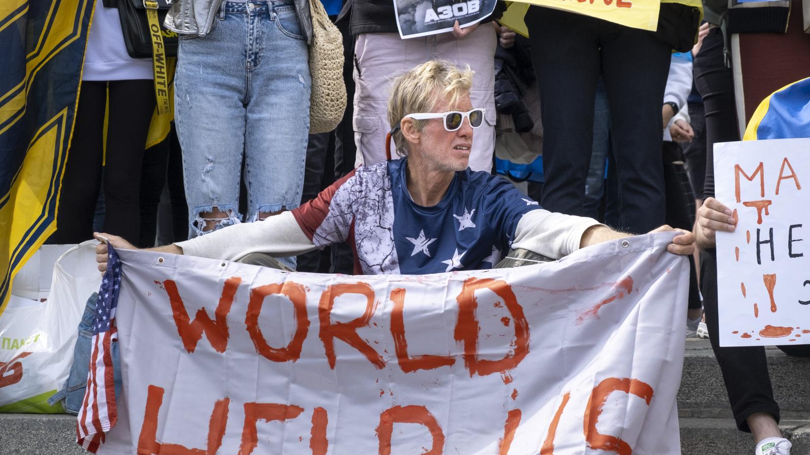 KYIV, UKRAINE - MAY 3: Ryan Routh holds a banner during a demonstration in support of Mariupol defenders on May 3, 2022 in Kyiv, Ukraine.