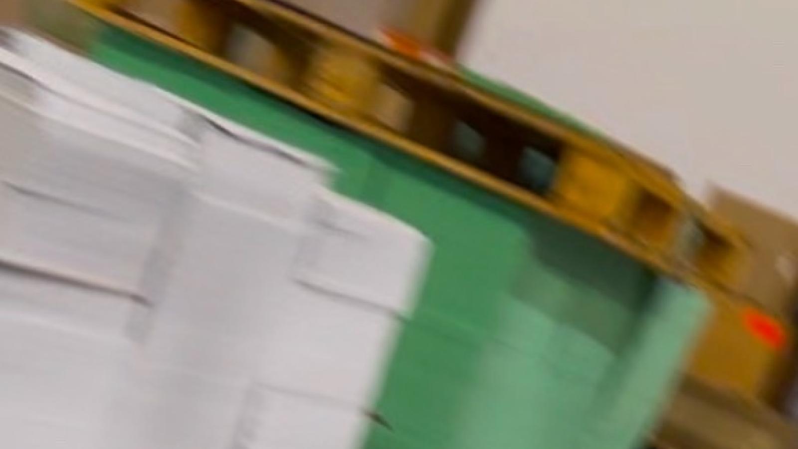 Pallets of ballots and envelopes stored in Runbeck warehouse.